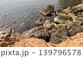Ocean waves hitting rocky coastline 139796578