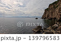 Beautiful sea waves crashing against rocks 139796583