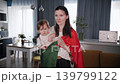 Football fan family generations supporting national team together during championship match at home 139799122