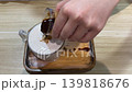 Pouring Espresso Shot Into Steamed Milk To Make Hot Latte Coffee 139818676