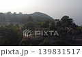 Tilla jogian drone orbit circling historic hilltop domed temples showing sikh heritage site in forest pakistan 139831517