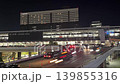 Time-lapse video of Shin-Osaka Station (night view) with cars passing by. 139855316