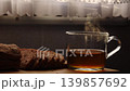 Steaming tea cup in caravan interior 139857692