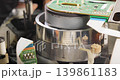 Video helical head vhs mechanism reading a video cassette VHS. 139861183