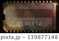 Vintage film effect with scratches and light leaks transitioning to a backyard barbecue with burgers and sausages on grill, cozy summer evening atmosphere 139877148