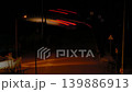 Timelapse: fast moving cars traffic, light trails along the dark road at night 139886913