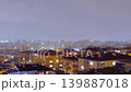 Timelapse: fast moving clouds over living apartment building in Turkey at night 139887018