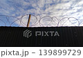 Prison fence with metal barbed wire 4K video footage 139899729