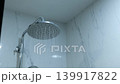Close up of shower water flowing in modern bathroom, relaxation and personal care concept 139917822