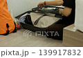 Happy Asian traveler packing luggage in bedroom before journey, vacation planning lifestyle theme 139917832