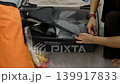Happy Asian traveler packing luggage in bedroom before journey, vacation planning lifestyle theme 139917833