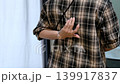 Asian woman scratching back due to skin irritation or allergy, wellness and healthcare concept 139917837