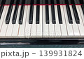 Piano playing music by itself closeup 139931824