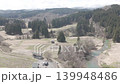 Aerial footage of the Japanese countryside, rice paddies, and the surrounding area of a sacred grove (Totoro's Tree). 139948486
