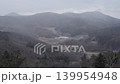 A distant view of Katsurao Village, Fukushima Prefecture, with snow falling. 139954948