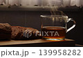 Steaming tea cup in caravan interior 139958282