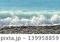 Turquoise sea wave breaking on pebble beach 139958859