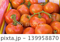 Organic red tomatoes at farmers market display 139958870