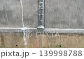 Heavy Rain Water Torrent Pouring Down On Residential Concrete Wall 139998788