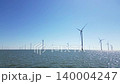 Green energy, wind turbines produce energy in the North Sea, wind farm power plant view from height, alternative energy sources. 140004247