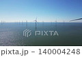 Water texture, wind turbines produce energy in the north sea, wind farm power plant view from height, green energy and alternative energy sources, windmill. 140004248