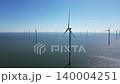 Alternative energy sources, wind turbines produce energy in the north sea, wind farm power plant view from height, green energy. 140004251