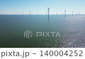 Green energy, wind turbines produce energy in the North Sea, wind farm power plant view from height, alternative energy sources. 140004252