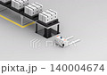 A pallet of boxes is lowered from a conveyor, and an autonomous pallet jack moves them  140004674