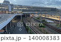 Trains stopped at the platform and Shinkansen trains passing through Shin-Osaka Station 140008383