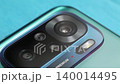 Macro close up of a smartphone camera lens on back 140014495