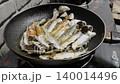 Close up of Sardine fish frying in an oil pan  140014496
