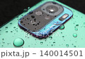 Macro close up of a smartphone camera lens on back 140014501