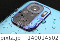 Macro close up of a smartphone camera lens on back 140014502