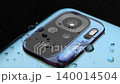 Macro close up of a smartphone camera lens on back 140014504