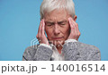 Senior woman suffering from severe headache pain 140016514