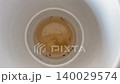 Mosquito Larvae Swimming In Dirty Stagnant Water Inside White Ceramic Cup 140029574