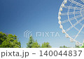 Ferris Wheel Swing in Amusement Park 140044837