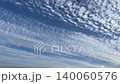 A refreshing autumn sky with white, cumulus-colored clouds (4K) 140060576