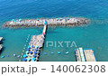boat pier in clear turquoise sea water at amalfi coast 140062308