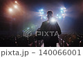 Silhouette of a Man with Helmet in Blinding Spotlight on Stage. Creative Triumph Concept 140066001
