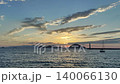 Seascape at sunset. Lighthouse on the coast. Seaside town of Turgutreis and spectacular sunsets 140066130