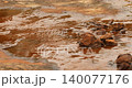 water running Through mossy rock 140077176