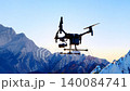 a swarm of drones conducting aerial surveying in high mountains 140084741