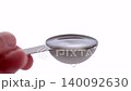 Clear liquid seasoning poured into a measuring spoon 140092630