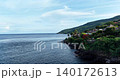 Scenic Aerial View of Cliffside Villas and Coastline in Amed Bali 140172613