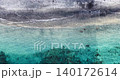 Top Down Drone View of Swimmers in Crystal Clear Water at Amed Bali 140172614