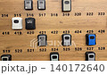 Row of combination lock boxes on a wooden wall display for secure key storage options video 140172640