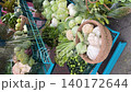 Fresh vegetables displayed in baskets at an outdoor market, suitable as a background image video 140172644