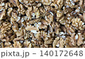 Walnuts in close-up form a textured background, ideal for culinary and healthy lifestyle themes video 140172648