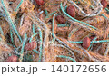 Colorful fishing nets and floats tangled together creating a textured maritime background video 140172656